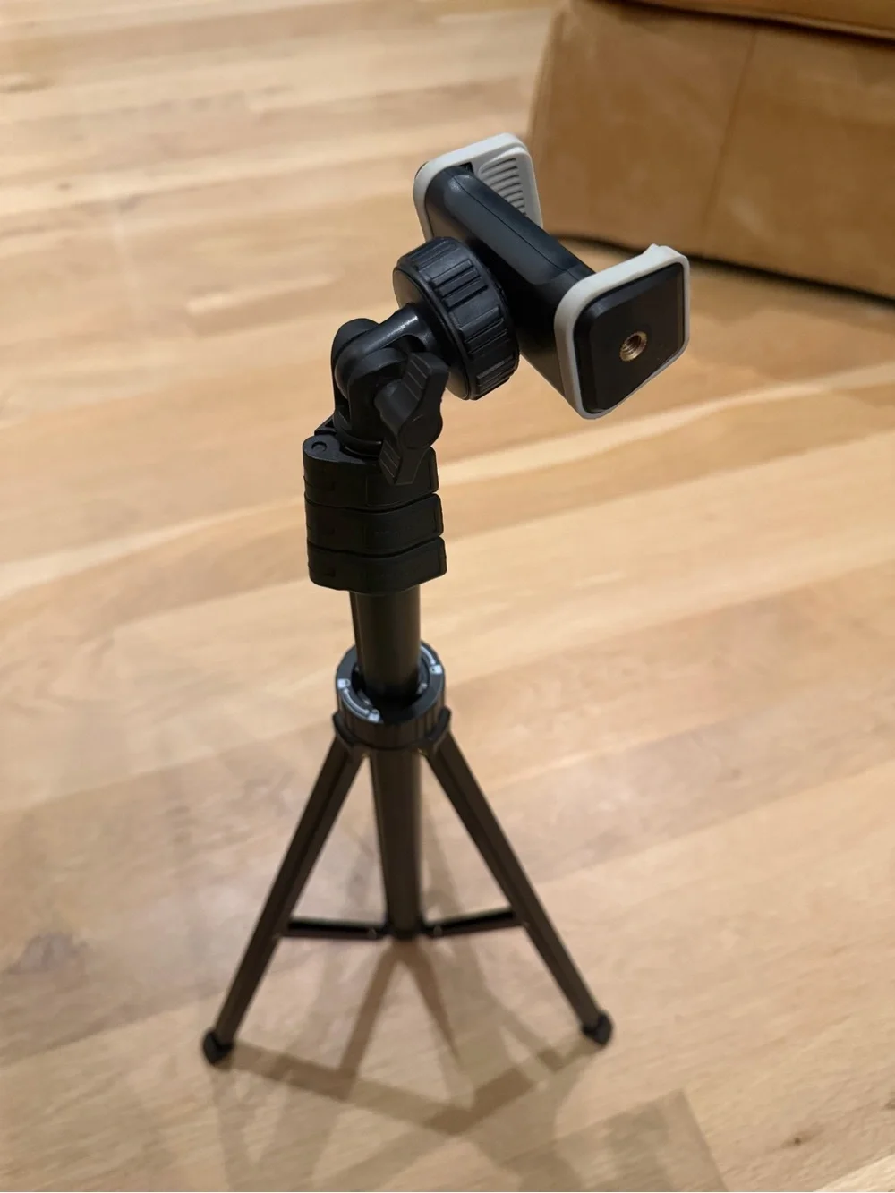 Compact Black Smartphone Tripod with Adjustable Phone Mount